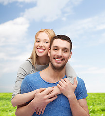 Image showing smiling couple hugging