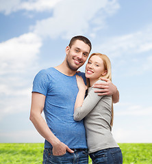 Image showing smiling couple hugging