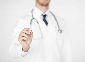 Image showing doctor writing something in the air