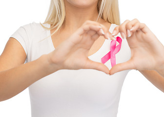 Image showing young woman with pink cancer awareness ribbon