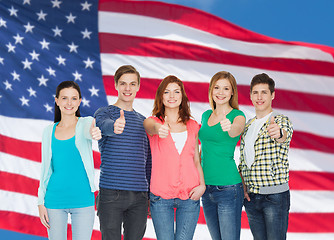 Image showing group of smiling students showing thumbs up