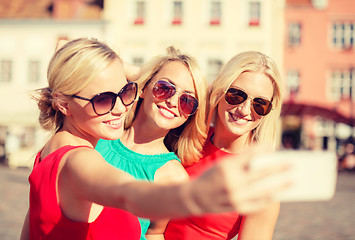 Image showing girls taking picture with smartphone camera