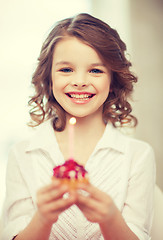 Image showing girl with cupcake