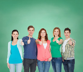 Image showing group of smiling students showing thumbs up