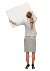 Image showing businesswoman or teacher in suit from back