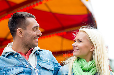 Image showing smiling couple in amusement park