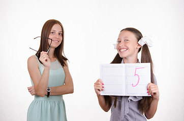 Image showing Schoolgirl very happy received five