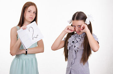 Image showing Schoolgirl crying because of two entries