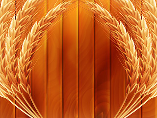 Image showing Wheat on wooden autumn background. EPS 10