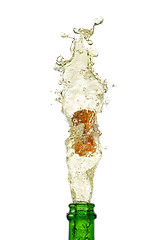 Image showing splashing champagne on a white background