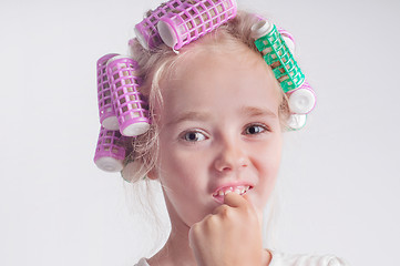 Image showing Cute child girl portrait in curlers