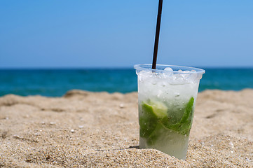 Image showing Mojito cocktail on the beach