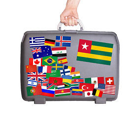 Image showing Used plastic suitcase with stickers