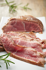 Image showing sliced roast beef on white plate