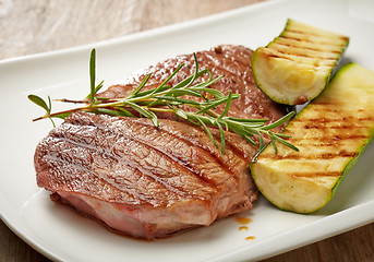 Image showing grilled beef steak and zucchini