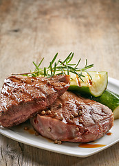 Image showing grilled beef steak on white plate