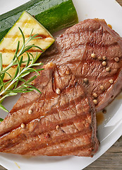 Image showing grilled beef steak on white plate