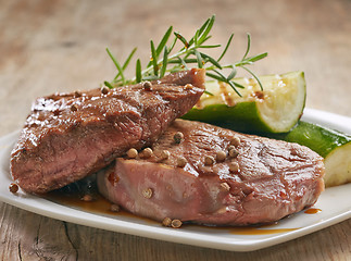Image showing grilled beef steak on white plate