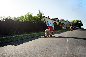 Image showing Longboarding Teens