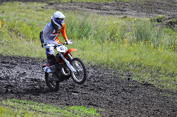 Image showing The motorcyclist on the motorcycle participates in cross-country