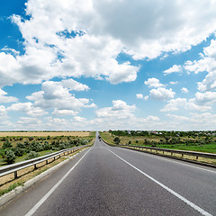 Image showing asphalt road goes to cloudy horizon