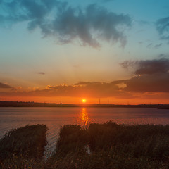 Image showing orange sunset over river