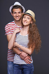 Image showing Young casual couple hugging