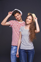 Image showing Young casual couple greeting