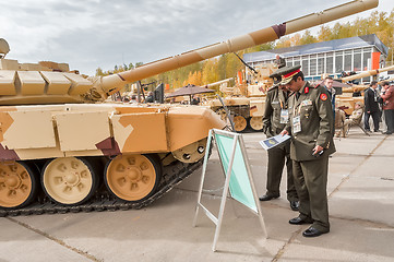 Image showing Officers of foreign army studies tank T-72. Russia