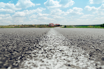 Image showing white line on asphalt road close up