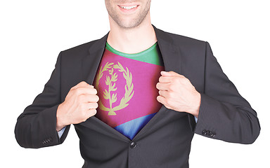 Image showing Businessman opening suit to reveal shirt with flag