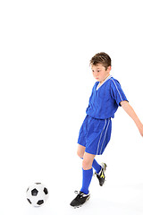 Image showing Child playing soccer