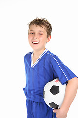 Image showing Happy boy holding soccer ball