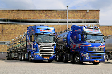 Image showing Blue Scania and Volvo Tanker Trucks 