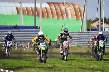 Image showing Cross-country race. Motorcyclists on start.