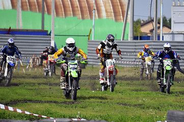 Image showing Cross-country race. Motorcyclists on start.