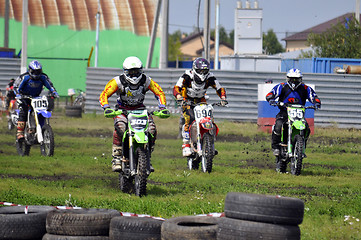 Image showing Cross-country race. Motorcyclists on start.