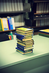 Image showing Stack of books on the table