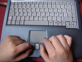 Image showing Working on computer