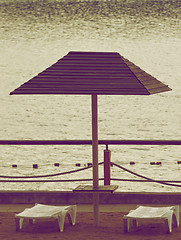 Image showing Beach Chairs and Parasol