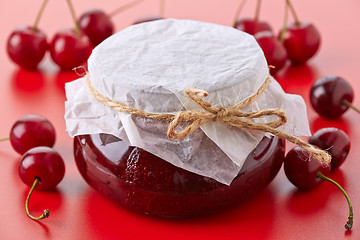 Image showing jar of fruit jam with cherries