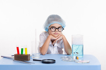 Image showing Girl bored chemist