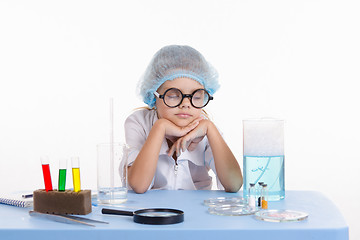 Image showing Chemist girl fell asleep during the lesson