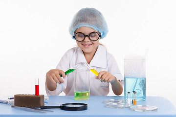 Image showing Young chemist in glasses posing experience