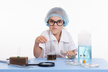 Image showing Girl chemist received a new substance