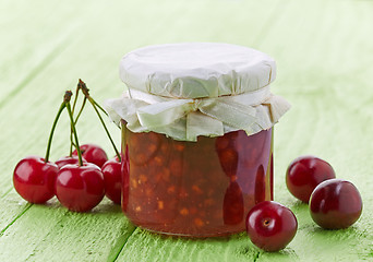 Image showing jar of cherry and apple jam