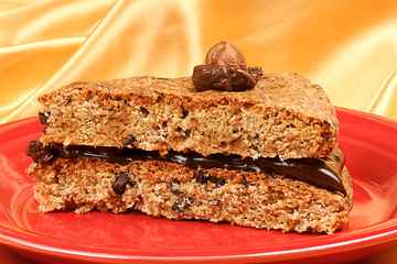 Image showing Slice of hazelnut and chocolate cream cake