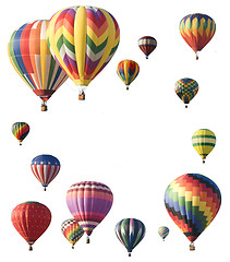 Image showing Hot-air balloons arranged around edge of frame allowing space fo