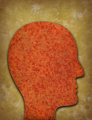 Image showing Rusty head silhouette against yellowed background