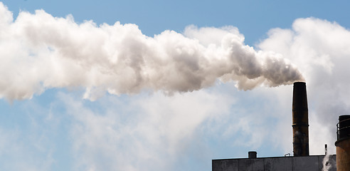 Image showing Paper Mill Smokestack White Smoke Blue Sky 